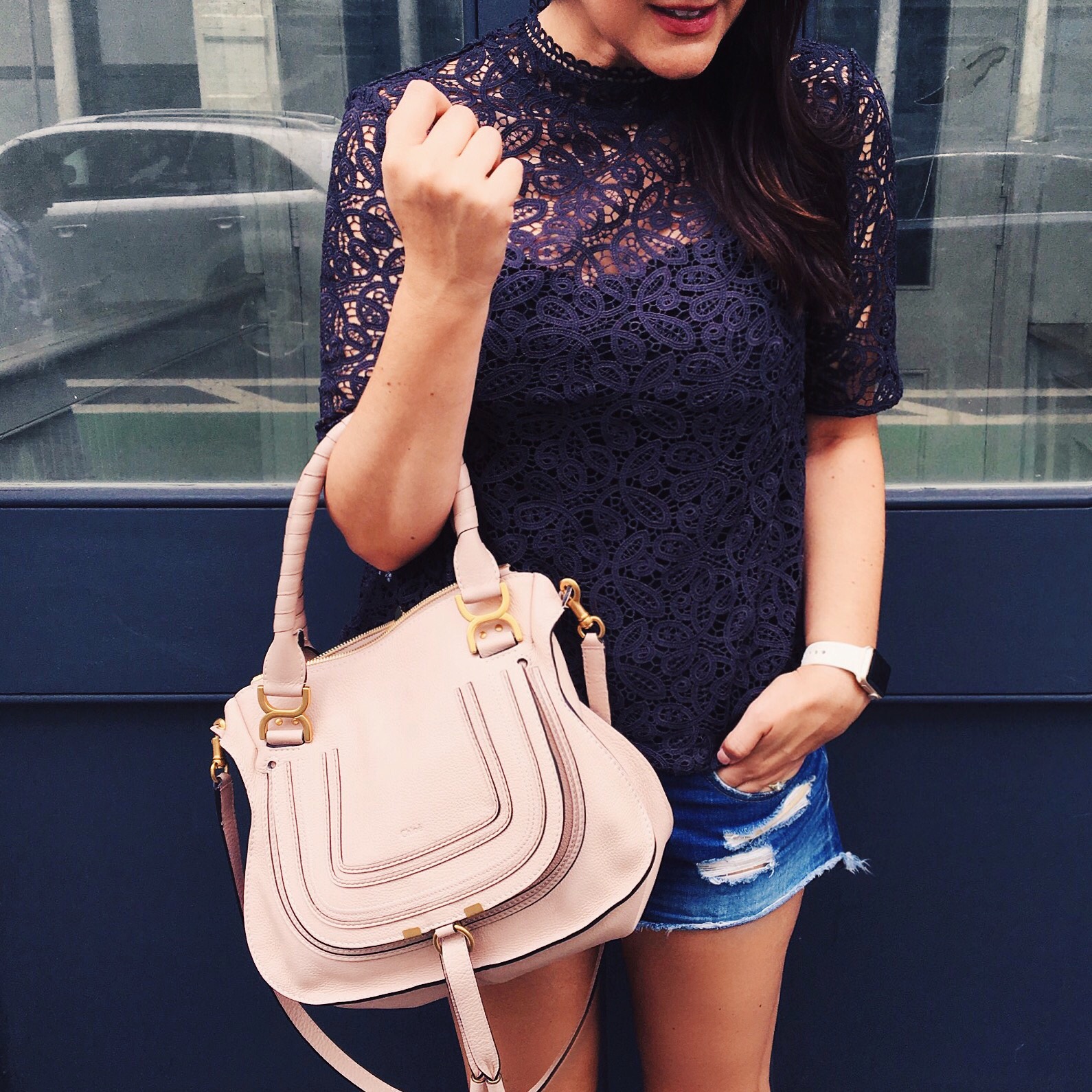 Grey lace top with cut offs and pink accessories on Kendi Everyday